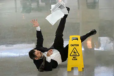 A man falling on a wet floor - Fall Law